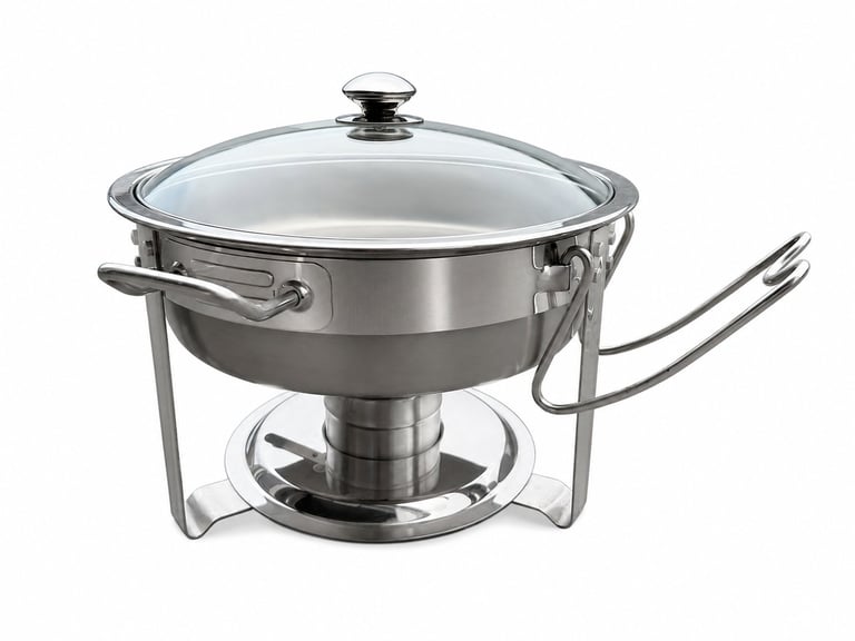 Stainless steel chafing dish with glass lid, stand, and serving fork on white background
